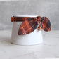 brown plaid cat collar with bow and bell